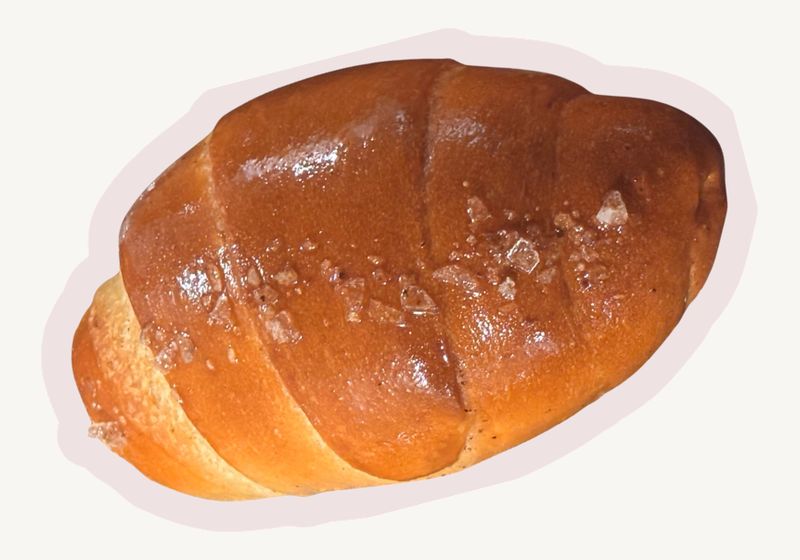 Signature shio pan, a salted butter roll with flaky sea salt